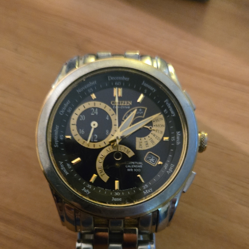 Citizen  Calibre 8700 Black and Gold Chronograph Watch